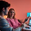 Couple engaging with AI technology in a romantic, modern setting enhancing ai sex experiences.