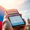 Explore sports betting apps Texas with a user-friendly interface showcased on a smartphone against a Texas backdrop.