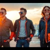 FLY88 fashion scene featuring aviation-inspired apparel against a vibrant sunset backdrop.