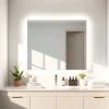 Enhance your bathroom's elegance with a feature mirror light mirror reflecting modern design.