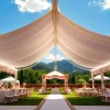 Tent Rentals elegantly set for an outdoor wedding with lush greenery backdrop and beautiful decorations.