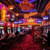 Excited gamblers at colorful slot machines in a lively casino showcasing kpi4d promotions.