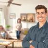 Home warranty technician inspecting appliances for service in a welcoming living room.