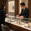 Luxury rolex replica watches on display in an upscale store setting, showcasing exquisite craftsmanship and attention to detail.