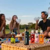Friends enjoying B Plus Bizarro Incense E-liquid 5ml while relaxing outdoors.