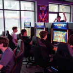 Engaged players enjoying zeus slot in a vibrant gaming lounge with colorful screens.